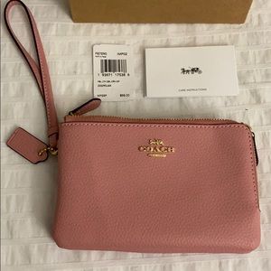 Brand new Coach Wristlet. Double zip